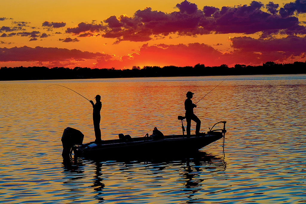 Picture of a Couple on a boat in the sunset